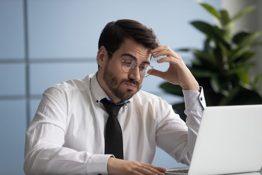 unhappy businessman with the cash crunch blues